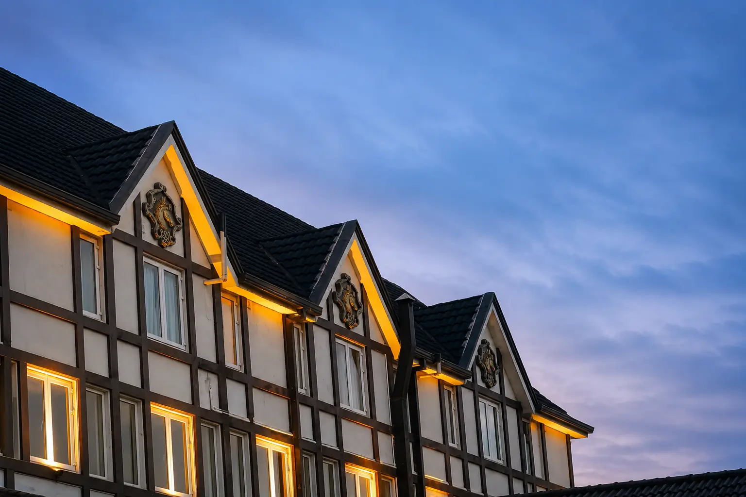Pedro Barn Hotel facade at dusk