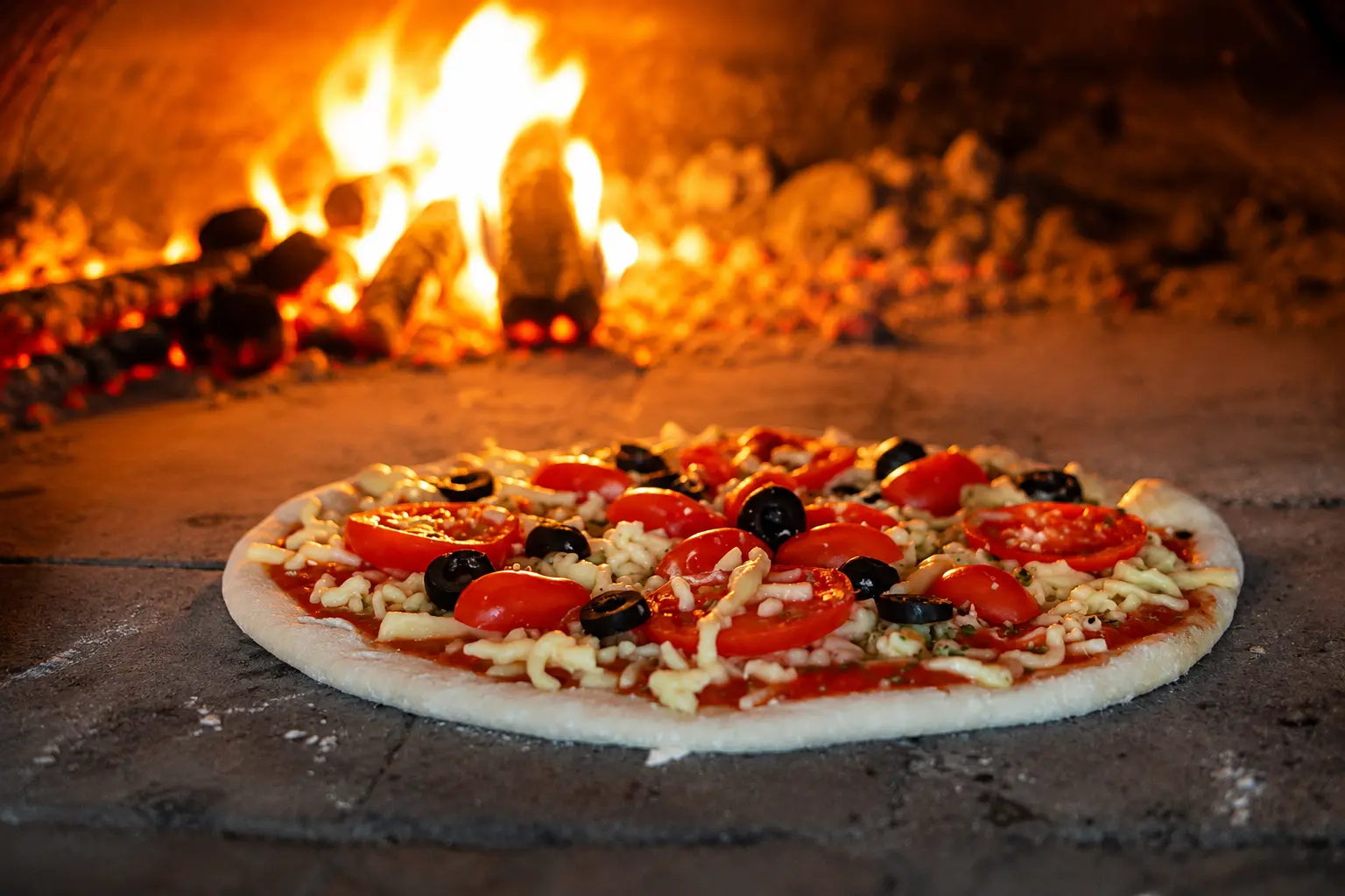 Fresh pizza in the wood fired oven at the Pedro Barn Hotel pub